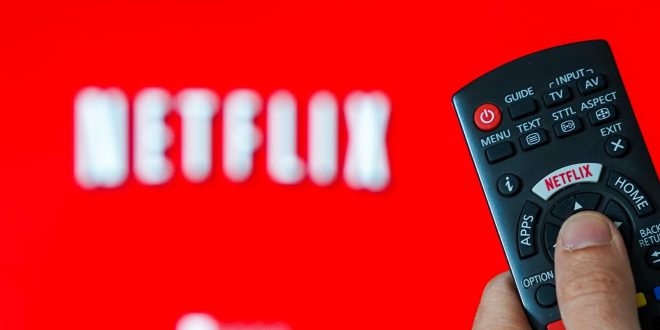 Mandatory Credit: Photo by Isopix/REX/Shutterstock (10184354a)
Illustration of the video streaming company Netflix. Logo Netflix on the keyboard of a remote control in front of a TV.
Netflix, Belgium - 01 Apr 2019