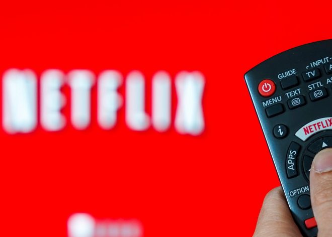 Mandatory Credit: Photo by Isopix/REX/Shutterstock (10184354a)
Illustration of the video streaming company Netflix. Logo Netflix on the keyboard of a remote control in front of a TV.
Netflix, Belgium - 01 Apr 2019